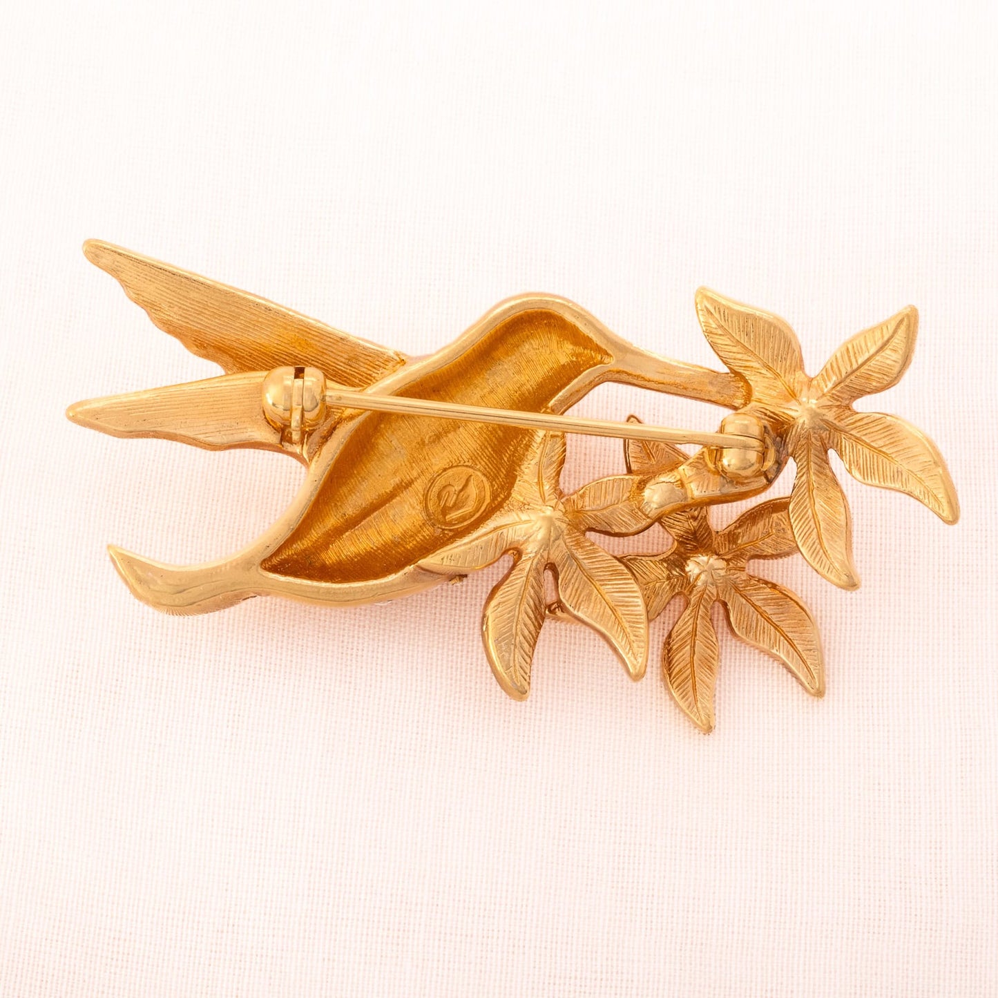 SWAROVSKI Brosche vergoldeter Kolibri mit Blumen