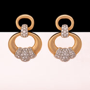 SWAROVSKI ear clips in an elegant door knocker shape set with crystals