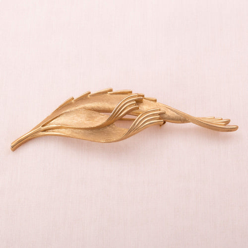 TRIFARI gold-plated, curved leaf brooch