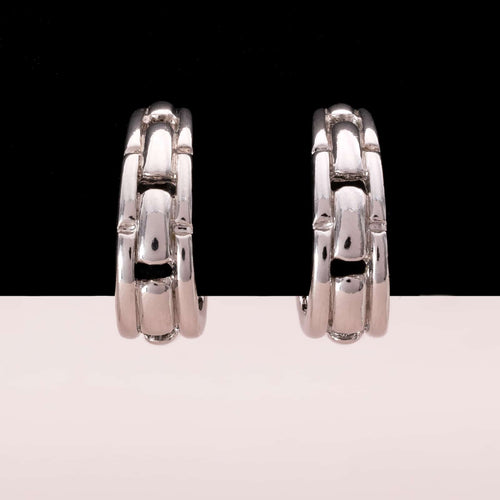 TRIFARI silver-colored hoop shaped clip-ons