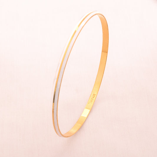 TRIFARI white bangle with gold-plated stripes