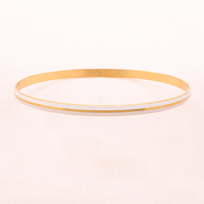 TRIFARI white bangle with gold-plated stripes
