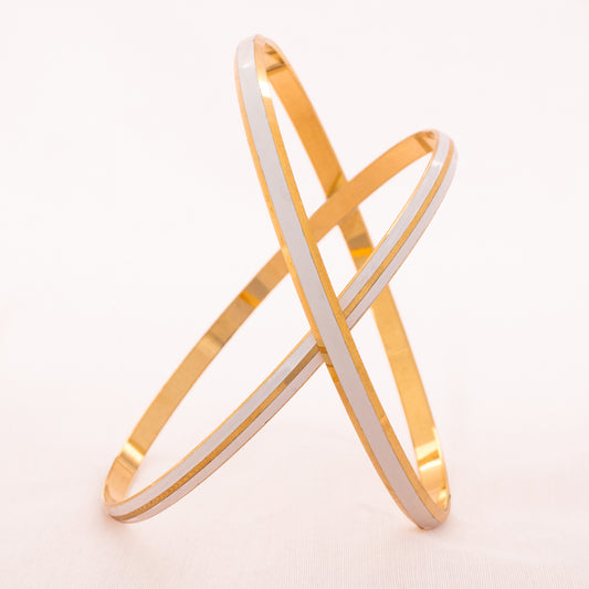 TRIFARI white bangle with gold-plated stripes