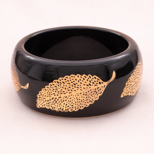 Black Lucile bangle with gold-plated leaves