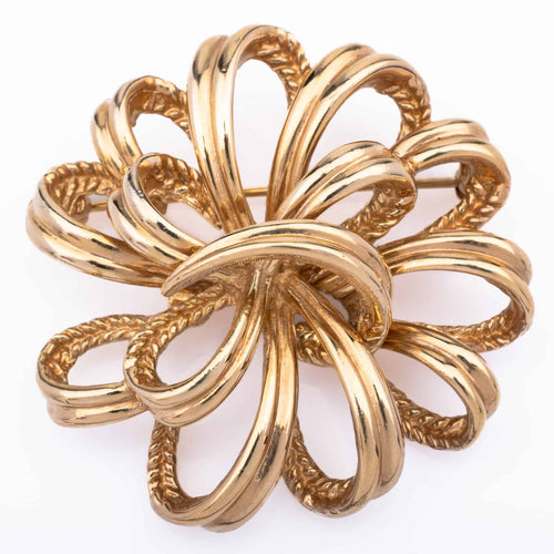 Gold-plated BOUCHER brooch in bow shape
