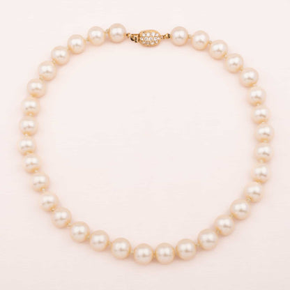 Ciner-Perlenkette-mit-Strass-Verschluss