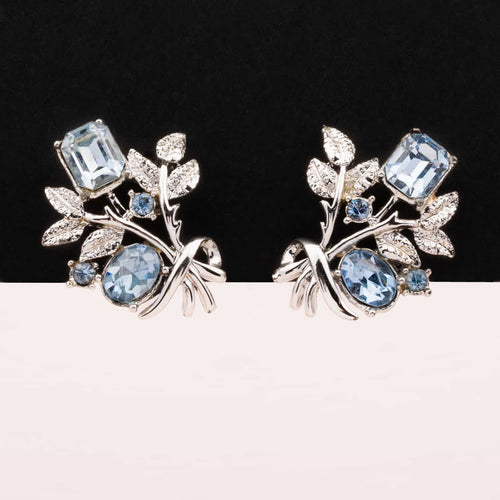 CORO silver-colored flower clip-on earrings with blue rhinestones