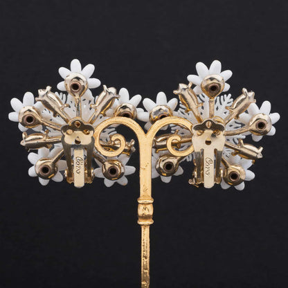 Coro-weiße-Blumen-goldfarbene-Rückseiten