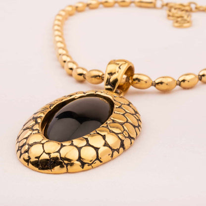 Givenchy-vergoldete-Halskette-mit-großem-ovalen-Anhänger-schwarzer-Cabochon