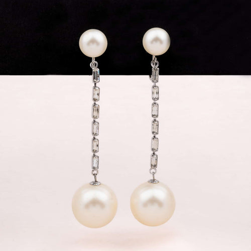 Long swinging vintage pearl earrings