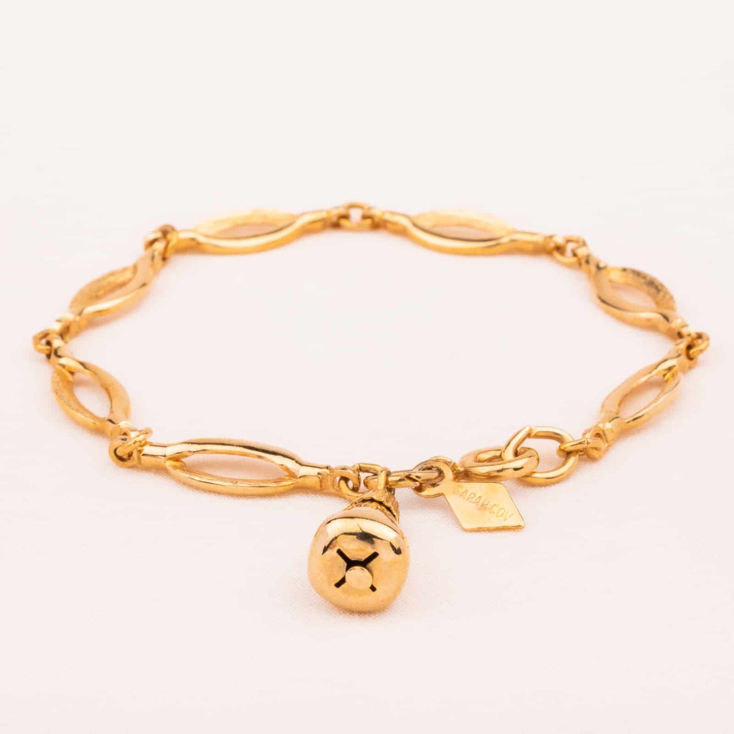 Sarah-Coventry-vergoldetes-Armband-mit-Charm-Anhänger