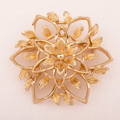 SARAH COVENTRY gold plated flower brooch