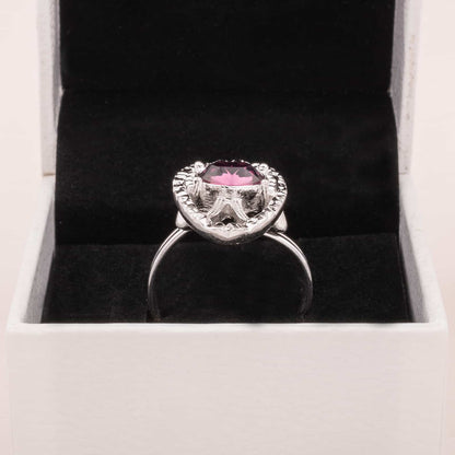 Sarah-Coventry-silberfarbener-Ring-mit-ovalem-lila-Kristall