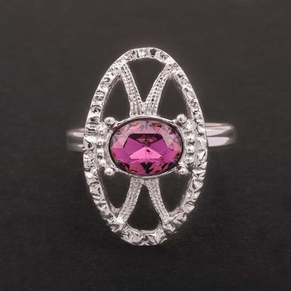 Sarah-Coventry-silberfarbener-Ring-mit-ovalem-lila-Kristall