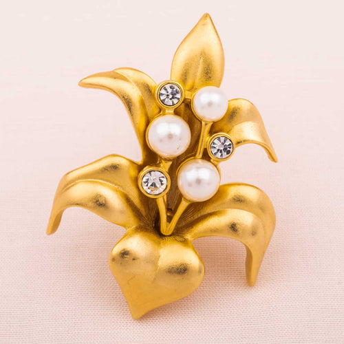 Vergoldete SWAROVSKI Blüten Brosche mit Perlen und Kristallsteinen besetzt