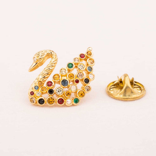 SWAROVSKI gold-plated swan pin brooch with colorful crystals