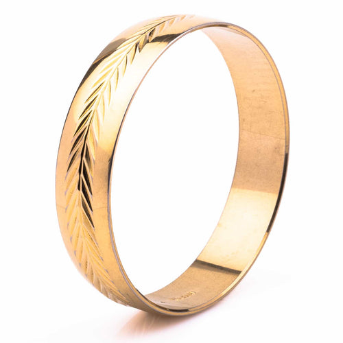 Gold-plated vintage bangle by TRIFARI from the 60s