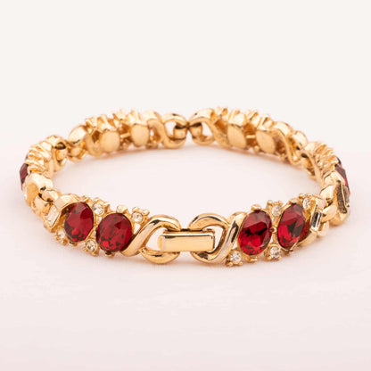 Trifari-vergoldetes-Armband-mit-roten-Strasssteinen