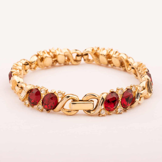 Trifari-vergoldetes-Armband-mit-roten-Strasssteinen