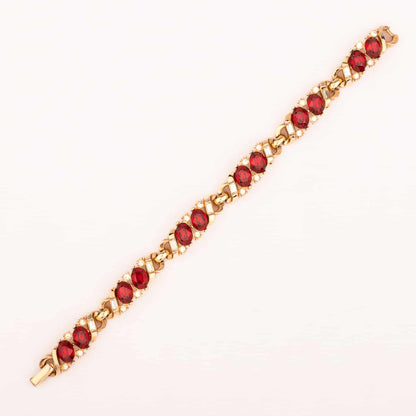 Trifari-vergoldetes-Armband-mit-roten-Strasssteinen