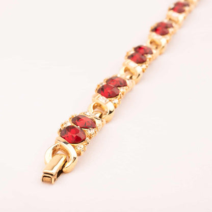 Trifari-vergoldetes-Armband-mit-roten-Strasssteinen