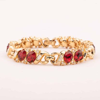 Trifari-vergoldetes-Armband-mit-roten-Strasssteinen