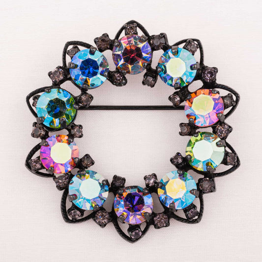 Warner-schwarze-Kranz-Brosche-mit-buntem-Strass