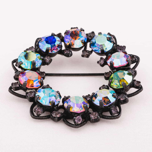 Warner-schwarze-Kranz-Brosche-mit-buntem-Strass