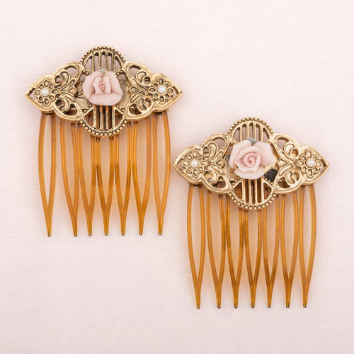 Two hair combs with porcelain roses and pearls